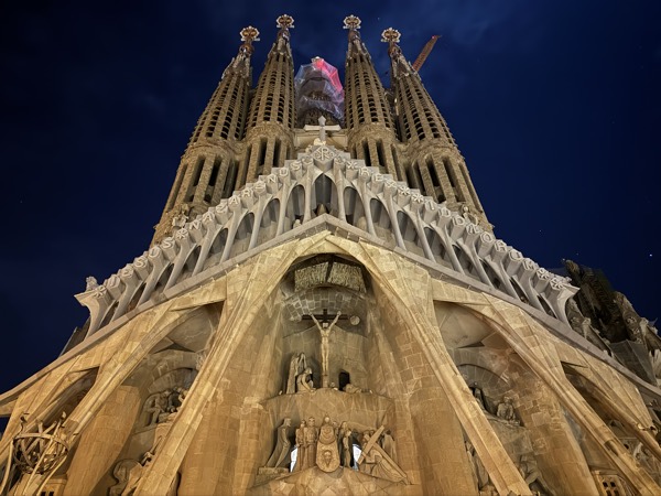 The Sagrada Família at night, looking straight up its towers