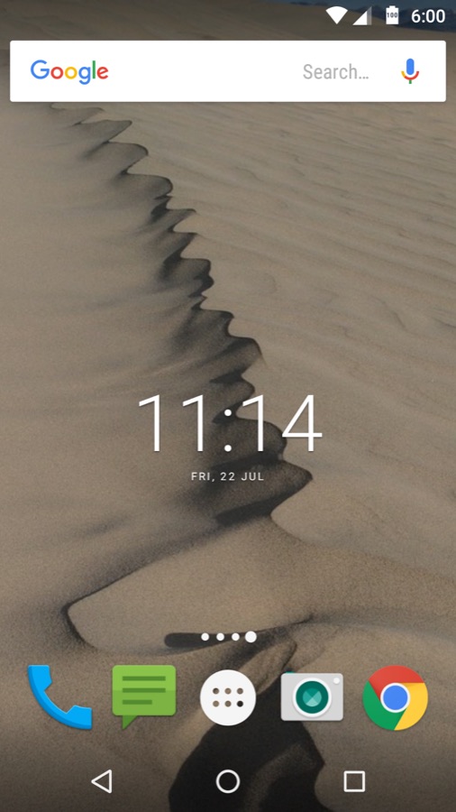 A rippled sand dune wallpaper on an Android home screen