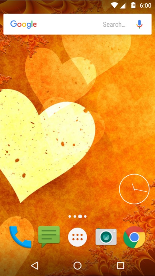 A yellow heart on a textured orange ground, as a wallpaper on an Android home screen